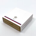 Rear view of a wooden case with a paper sleeve and mint logo.