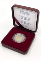 Minca je uložená v koženkovej etui s certifikátom.