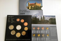 Zdná strana mincí so strieborným žetonom Zdná strana mincí so strieborným žetonom